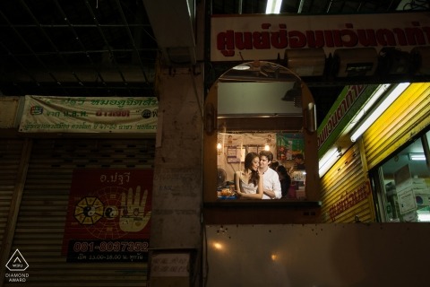 Thailand wedding and portrait photographer captured this couple embracing indoors Phuket destination engagement photography | Thailand wedding and portrait photographer captured this couple embracing indoors