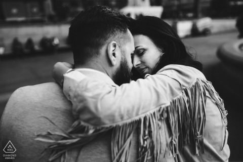 Black and white engagement portrait of a couple from England