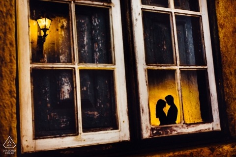 Brazil couple reflected in silhouette window framing for their pre-wedding engagement shoot
