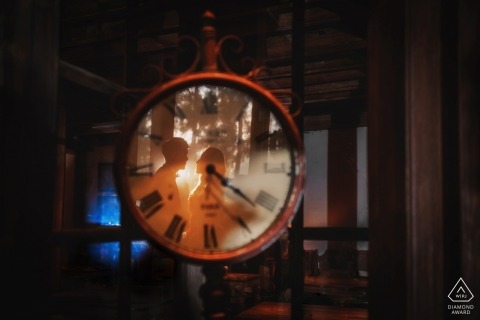 Fujian pre-wedding engagement pictures of a couple reflected in a clock face | couple photography session