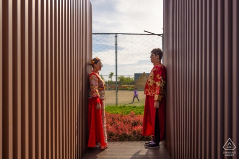 China engagement images of a couple in red traditional wear | Liaoning photographer pre-wedding session for portraits