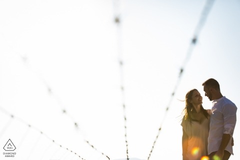 A Madrid engaged couple pose for their pre-wedding portraits for Spain engagement photographer