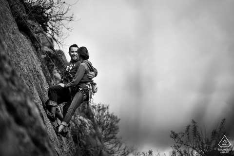 Toledo, Castilla-La Mancha (Spain) Engagement Portrait - Climbing couple at a rock wall 