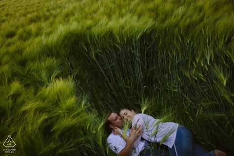 Engagement Portrait of Couple in Grass in Aachen 