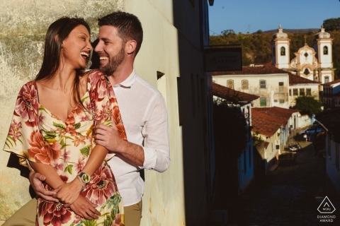 Pre Wedding Pictures from Ouro Preto, Brazil -  Engaged couple above the village in the afternoon sunlight and shadows.