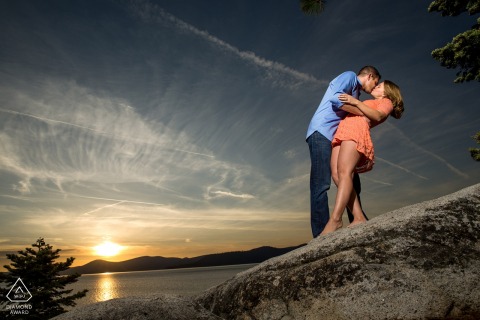 North Lake Tahoe Couple doing dip during sunset (almost) | Engagement Portrait of a Couple - Image contains: beach, water, tree, sky
