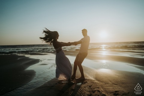 Royan engagement photoshoot at the beach right at the water's edge