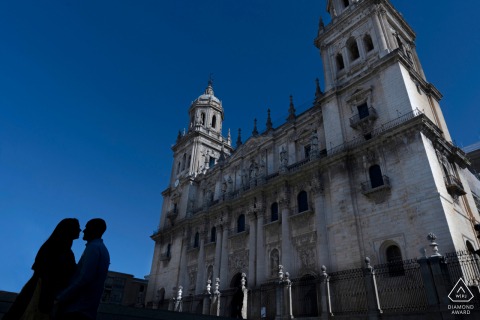 Jaén, Spain Pre-Wedding portrait shoot with a blue sky and a couple silhouetted