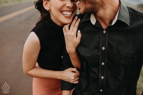 Toledo, Parana pre wedding portrait session with engaged lovers having an easy laugh