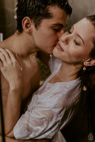 Toledo, Parana pre-wedding photo session with an engaged couple posing in the water in wet t shirt for an Intimate photo