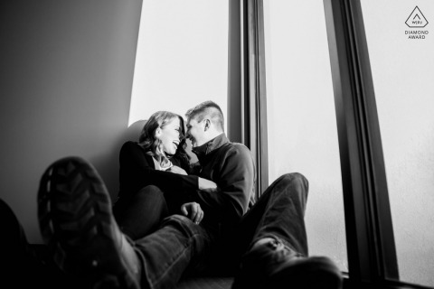 Fargo, North Dakota small indoor photo session with the couple before the wedding day with a laugh during a negative degree shoot
