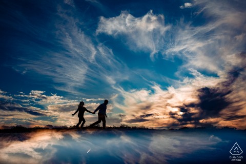 Caumsett State Park pre wedding couple Engagement Session under the reflected clouds
