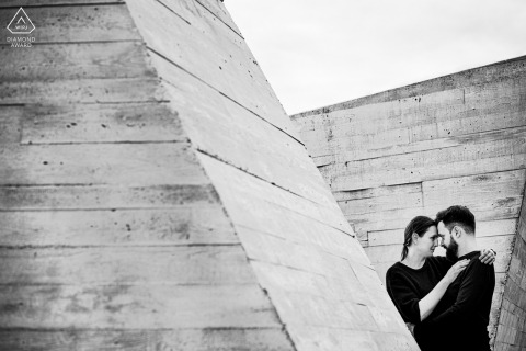 True Love Engagement Posed Portrait in Dolni Vestonice capturing a BW Architectural couple