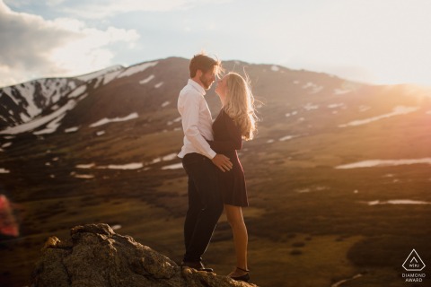 Guanella Pass, Georgetown, Colorado couple e-shoot with some embracing in the mountain sunset