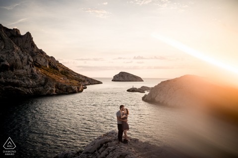 Marseille couple e-session above the sea waters during the golden hour