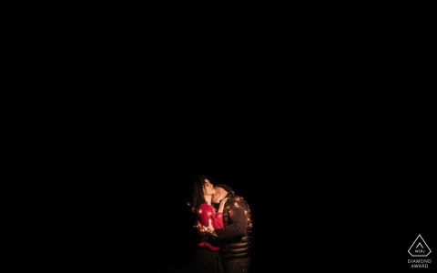 Amambai  bride and groom to be, posing for a pre-wedding engagement photo shoot on a night where there was only one light source: the one that was in them