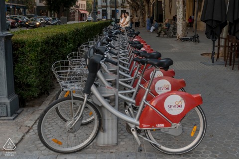 An after the marriage proposal Seville engagement photograph showing a rack of parked bikes