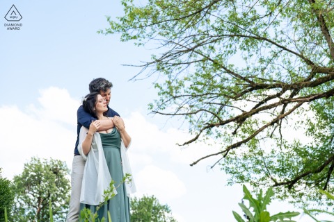 Near Verdun in Saint-Mihiel, France, a future bride and groom share an intimate hug during their engagement session.