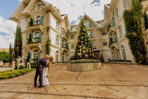Engaged couple pose for a romantic, intimate portrait at Colline Del France hotel in Gramado, Brazil.