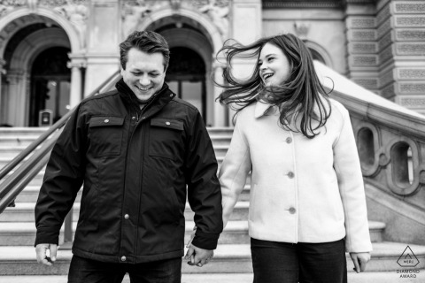 Engaged Couple in Washington DC: Romantic, Joyful Portrait Walking Down Library of Congress Steps Engaged couple in Washington DC, walking down Library of Congress steps, sharing a romantic joyful portrait.