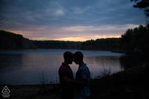 At sunset in Middlesex Fells Reservation, a couple’s silhouettes appear against the shimmering reservoir water.