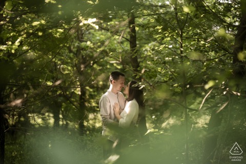 Engaged Couple's Pre-Wedding Portrait Embraced By Nature In Trezzo Sull'Adda Forest Engaged couple's pre-wedding portrait in Trezzo sull'Adda forest, surrounded by nature.