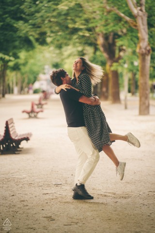 Dance Amidst Porto’s Gardens: A Warm and Joyful Connection At the Palacio de Cristal Gardens in Porto, Portugal, a couple dances together in a vertical portrait. Warm tones highlight their joyful connection amid the garden’s lush, romantic surroundings.