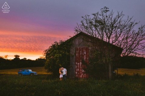 At sunset in Gambrills, Maryland, this portrait captures the couple visiting the old barn the boy used to climb when he was young, taking a meaningful picture at a special, nostalgic location.