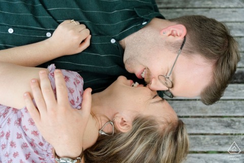 This meaningful portrait at a private estate in Brooksville, Maine, captures the engaged couple enjoying time on the very property where they will be getting married next summer, marking a special memory.