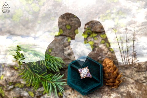 This portrait at Mohawk Lake, Breckenridge, Colorado, uses a show-through photo to highlight the newly engaged pair's silhouette, with a sharp focus on their unique engagement ring.