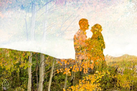 Couple’s silhouettes stand out boldly against the vibrant fall foliage at Lake Dillon, Colorado, creating a creative and visually striking engagement portrait filled with autumn color and natural beauty.