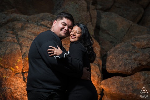 Portrait Showcases Pure Joy Of Couple Exploring Rugged Terrain Within Rocky Mountain National Park Colorado This portrait showcases a couple's pure joy at being in each other's company while exploring the rugged and beautiful terrain of Rocky Mountain National Park in Estes Park, Colorado.