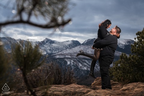 Joyous Couple Celebrates Love Surrounded By Breathtaking Alpine Scenery At Rocky Mountain National Park Colorado A joyous couple celebrates their love in the mountains of Colorado at Rocky Mountain National Park, Estes Park, surrounded by the breathtaking alpine scenery and clear, fresh mountain air.