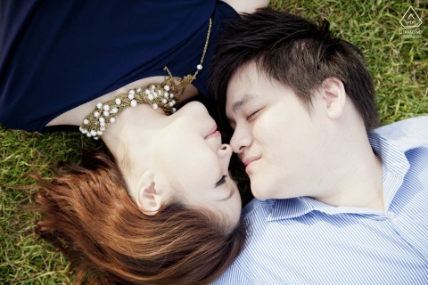 Sharing a quiet and affectionate interaction, the couple poses for their engagement session in Paris, France.