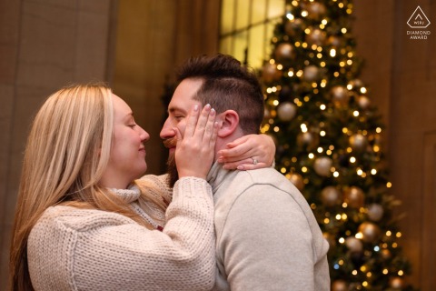 Engaged on Christmas Day, this couple stares into each other's eyes with pure joy during their celebratory portrait session in the heart of downtown Montreal, Quebec, Canada.