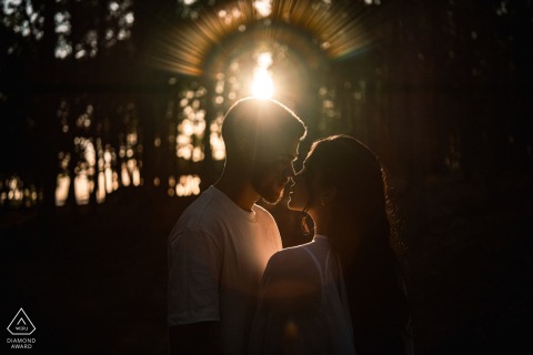 Bathed in the soft half-light of the setting sun, the couple shares a quiet and romantic connection during their evening engagement portrait session at Mar de Eucaliptos in Maceio.