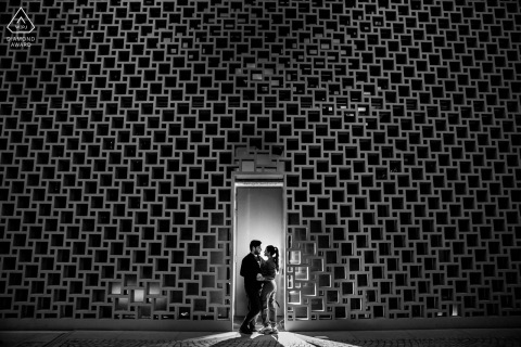 A stylish couple enjoys a romantic pre-wedding photo session at Galata Port in Istanbul, Turkey.