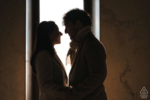 Posing for their pre-wedding photos in Cazorla, Jaén, Spain, the couple pose indoors providing a charming setting for their love and anticipation.