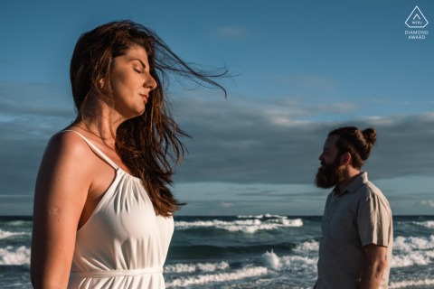 At Praia do Francês, Alagoas, Brazil, the pair stands apart in the wind, taking in the serenity of the beach and each other’s company.