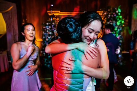 Kohl Mansion in Burlingame, California serves as the backdrop for candid reception moments, capturing the energy and connections shared by the bride and guests.