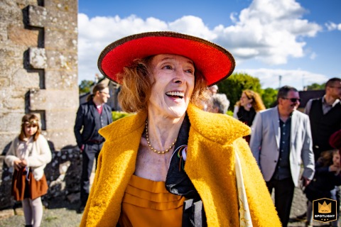 In Autun, a WPJA wedding photo captures a grandmother wearing a hat.