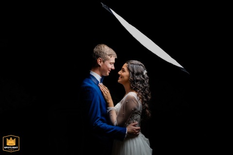 At Emmanuel Church in Massachusetts, a touch of magic fills the air as the bride’s veil floats above, beautifully spotlighting the newlyweds’ sweet and heartfelt connection.