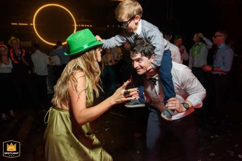 At Puerto Norte in Rosario, Argentina, the groom’s nephew joyfully dances on the floor, his energetic moves capturing the fun and lively spirit of the wedding celebration.