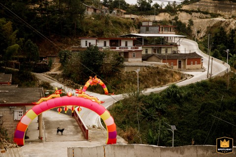 In the rural mountains of Fujian Province, China, a wedding unfolds. The unique event is surrounded by stunning scenery, capturing a memorable and traditional celebration in a remote location.