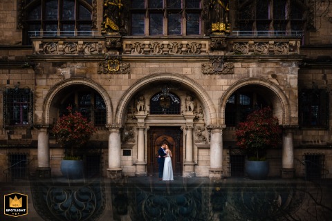 A Historic Duisburg Rathaus Romance: A Couple's Timeless Wedding Portrait Romantic wedding portrait of a couple in front of the historic Duisburg Rathaus in Germany.