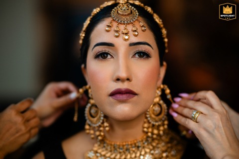 Getting Ready at Home: The Bride's Final Moments of Calm Bridal hair and makeup at the bride's home, with the artist and bride getting ready.