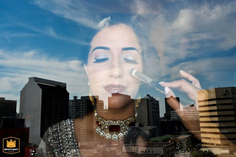 Fort Garry Hotel City View: The Bride's Serene Wedding Makeup Moment Bride gets makeup applied with a city view from the Fort Garry Hotel.