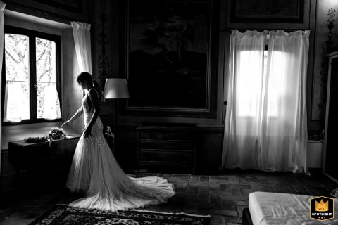 Bridal Radiance at Palazzo Viviani: A Black and White Portrait in Rimini Black and white portrait of a bride in her sparkling dress at the Palazzo Viviani in Rimini, Italy.