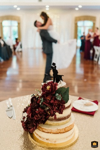 Sweetly Topped in the Magnolia Room: A Rock Hill, South Carolina Wedding Bride and groom cake topper at a wedding reception in the Magnolia Room, Rock Hill, South Carolina.