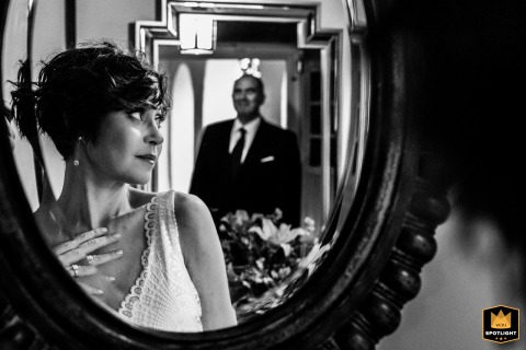 Reflection of a Groom Seeing His Bride at The Winslow House in Orleans Mirror reflection of groom seeing his bride at The Winslow House in Orleans for their wedding.